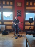 Chris Nickey and his Guitar photo
